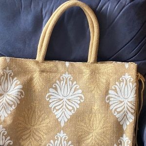 Burlap bag w/white & gold designs